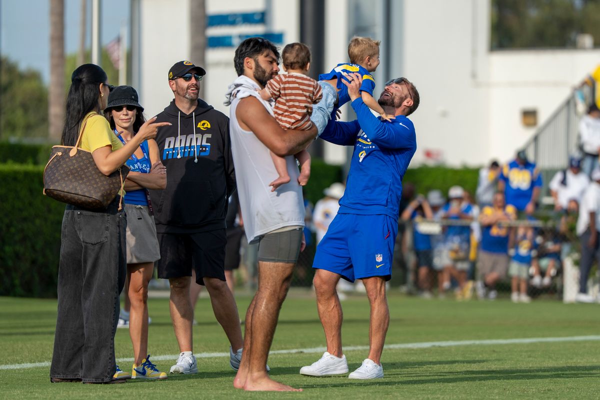 Puka Nacua #12 and head coach Sean McVay of the Los Angeles Rams with their families during Rams training camp at Loyola Marymount University on Wednesday, August 5th in Westchester, CA.