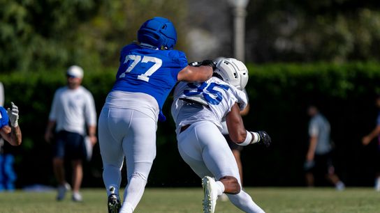 Alaric Jackson #77 of the Los Angeles Rams blocking Myles Garrett #95 during Rams training camp at Loyola Marymount University on Wednesday, August 5th in Westchester, CA.