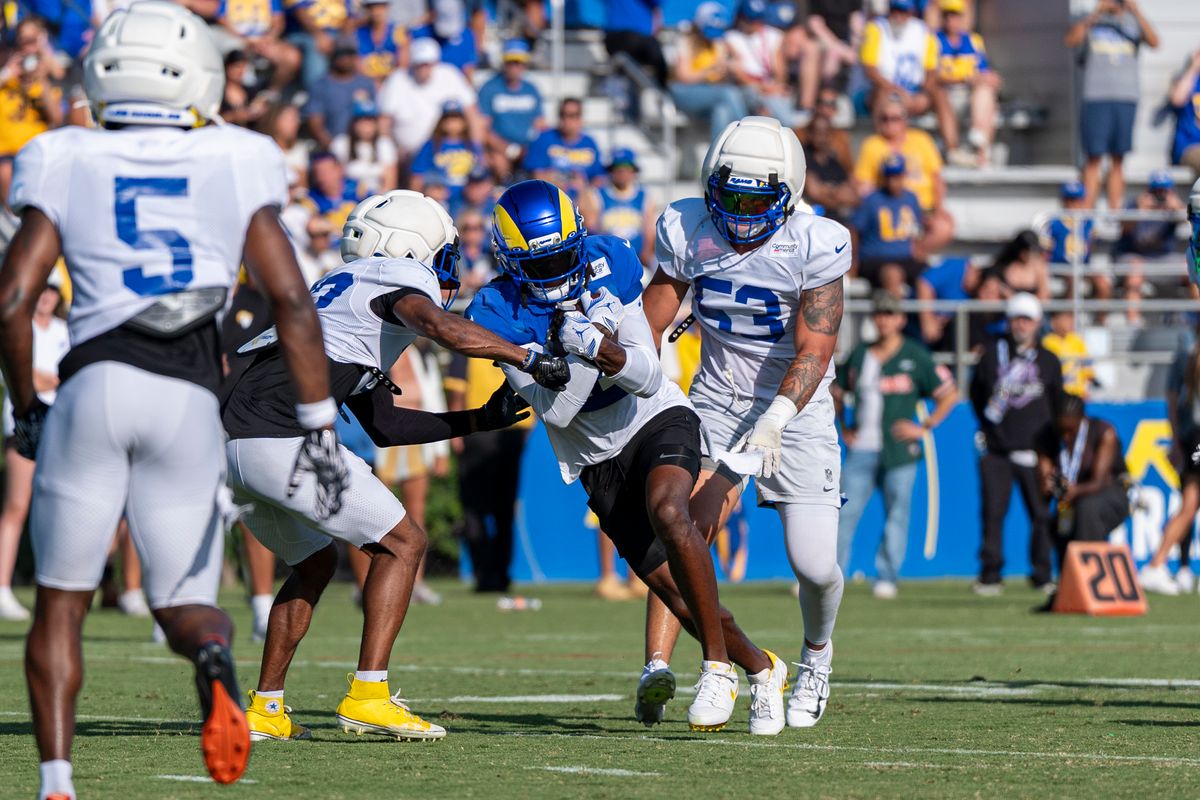 Davante Adams #17 of the Los Angeles Rams running after a catch during Rams training camp at Loyola Marymount University on Wednesday, August 5th in Westchester, CA. Davante Adams #17 of the Los Angeles Rams running after a catch during Rams training camp at Loyola Marymount University on Wednesday, August 5th in Westchester, CA.