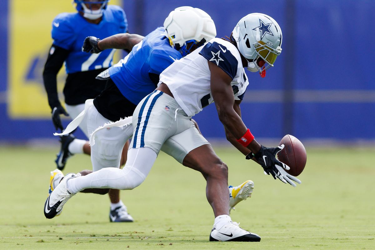 George Pickens #3 of the Dallas Cowboys picks up a loose ball during joint practice between the Dallas Cowboys and the Los Angeles Rams at Rams Village on August 11, 2026 in Woodland Hills, California. George Pickens #3 of the Dallas Cowboys picks up a loose ball during joint practice between the Dallas Cowboys and the Los Angeles Rams at Rams Village on August 11, 2026 in Woodland Hills, California.