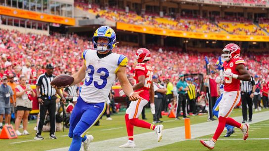 Los Angeles Rams running back Dean Connors (33) scores a touchdown during the second half against the Kansas City Chiefs at at Arrowhead Stadium.
