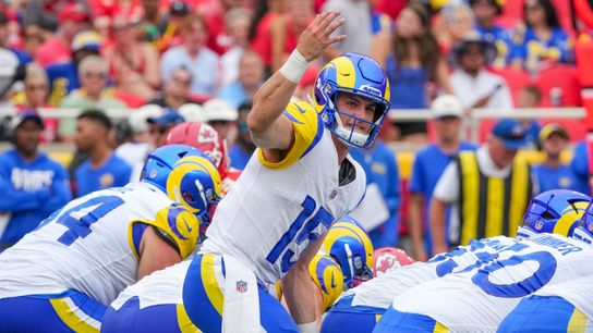  Los Angeles Rams quarterback Ty Simpson (15) signals at the line against the Kansas City Chiefs during the first half of the pre season game at Arrowhead Stadium.