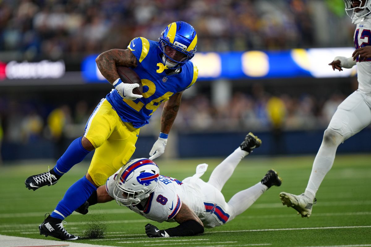 Buffalo Bills linebacker Terrel Bernard (8) pushes Los Angeles Rams running back Blake Corum (24) out of bounds during an NFL football game on October 12, 2026, at SoFi Stadium in Los Angeles, CA.