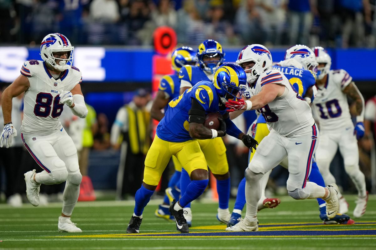 Los Angeles Rams cornerback Jaylen Watson (35) runs with the ball following an interception during an NFL football game against the Buffalo Bills on October 12, 2026, at SoFi Stadium in Los Angeles, CA.