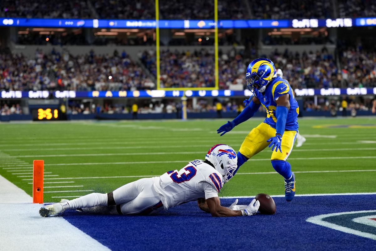 Los Angeles Rams cornerback Josh Wallace (30) breaks up a pass intended for Buffalo Bills wide receiver Skyler Bell (13) during an NFL football game on October 12, 2026, at SoFi Stadium in Los Angeles, CA.