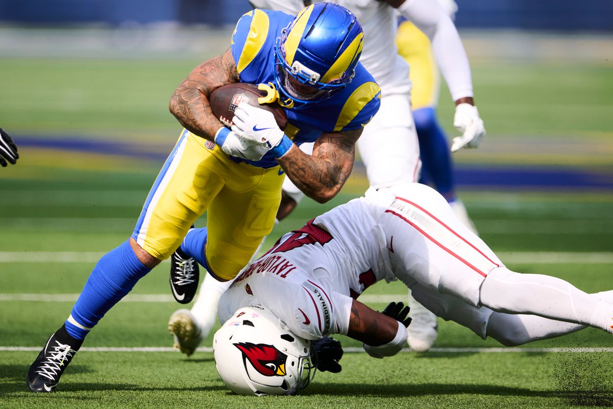 The Los Angeles Rams running back Blake Corum (24) runs the ball during an NFL football game against The Arizona Cardinals on October 18th, 2026 at SoFi Stadium in Los Angeles, California. The Los Angeles Rams running back Blake Corum (24) runs the ball during an NFL football game against The Arizona Cardinals on October 18th, 2026 at SoFi Stadium in Los Angeles, California.