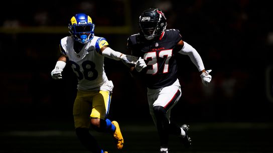 Shaun Jolly #38 of the Los Angeles Rams defends against D'Angelo Ross #37 of the Houston Texans during a preseason game at NRG Stadium on August 24, 2024 in Houston.