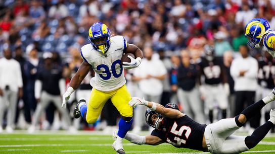Boston Scott #30 of the Los Angeles Rams runs with the ball during a preseason game against the Houston Texans at NRG Stadium on August 24, 2024 in Houston.