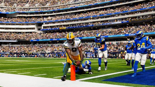 Josh Jacobs #8 of the Green Bay Packers dives for the end zone during the first half against the Los Angeles Rams at SoFi Stadium on October 6, 2024 in Inglewood, California. Josh Jacobs #8 of the Green Bay Packers dives for the end zone during the first half against the Los Angeles Rams at SoFi Stadium on October 6, 2024 in Inglewood, California.