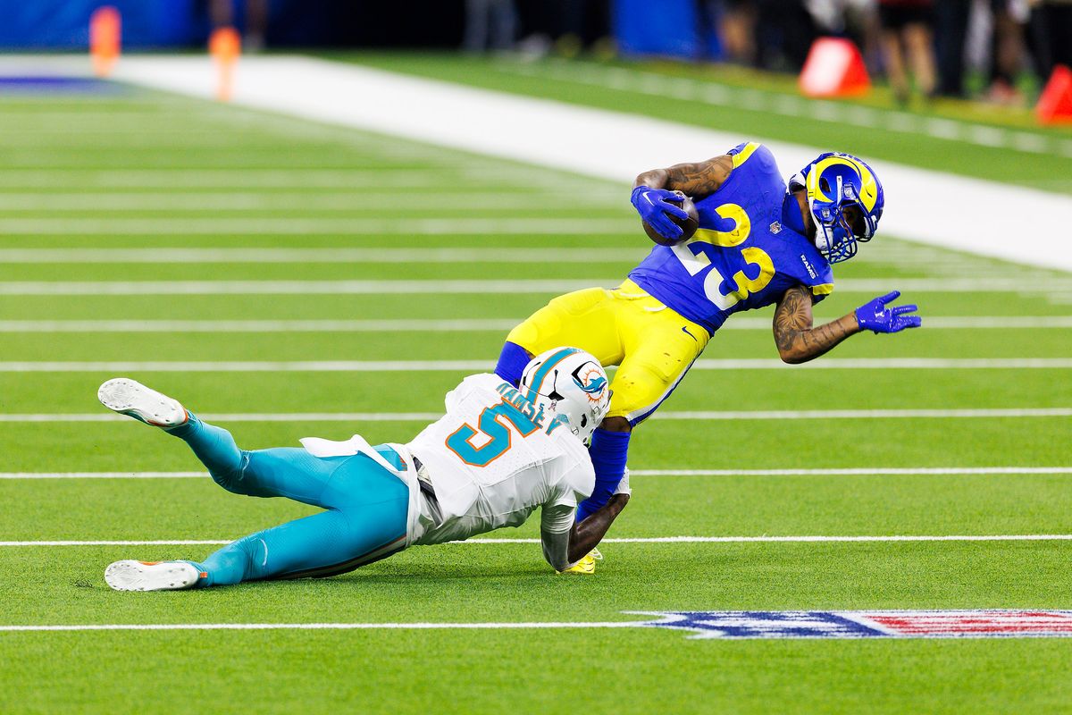 Jalen Ramsey #5 of the Miami Dolphins tackles Kyren Williams #23 of the Los Angeles Rams during the first half at SoFi Stadium on November 11, 2024 in Inglewood, California. Jalen Ramsey #5 of the Miami Dolphins tackles Kyren Williams #23 of the Los Angeles Rams during the first half at SoFi Stadium on November 11, 2024 in Inglewood, California.