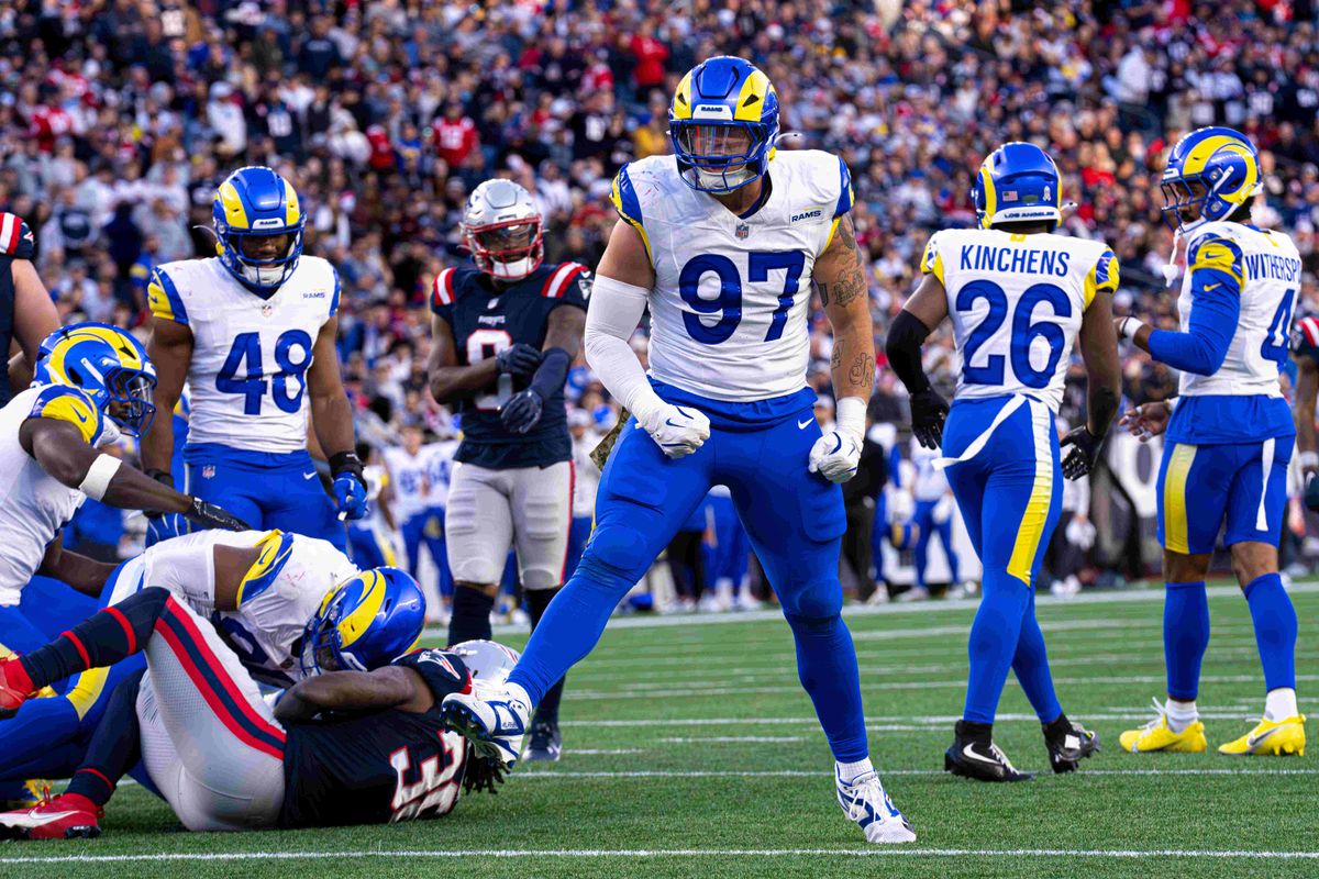 Michael Hoecht #97 of the Los Angeles Rams celebrates a defensive stop against the New England Patriots during the second half at Gillette Stadium on November 17, 2024 in Foxborough, Massachusetts. Michael Hoecht #97 of the Los Angeles Rams celebrates a defensive stop against the New England Patriots during the second half at Gillette Stadium on November 17, 2024 in Foxborough, Massachusetts.