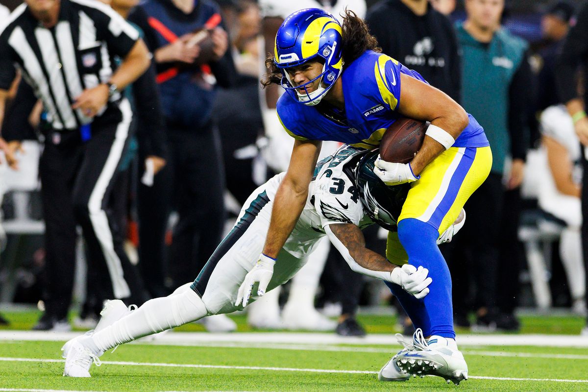 uka Nacua #17 of the Los Angeles Rams is tackled by Isaiah Rodgers #34 of the Philadelphia Eagles during the second half against the Philadelphia Eagles at SoFi Stadium on November 24, 2024 in Inglewood, California. 