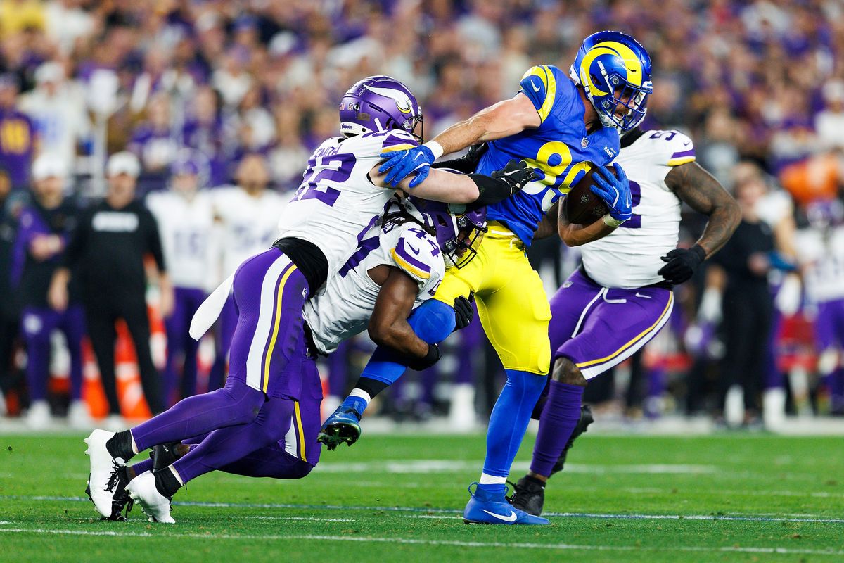 Tyler Higbee #89 of the Los Angeles Rams is tackled during the first half of the NFC Wild Card Playoff game against the Minnesota Vikings at State Farm Stadium on January 13, 2025 in Glendale, Arizona. Tyler Higbee #89 of the Los Angeles Rams is tackled during the first half of the NFC Wild Card Playoff game against the Minnesota Vikings at State Farm Stadium on January 13, 2025 in Glendale, Arizona.