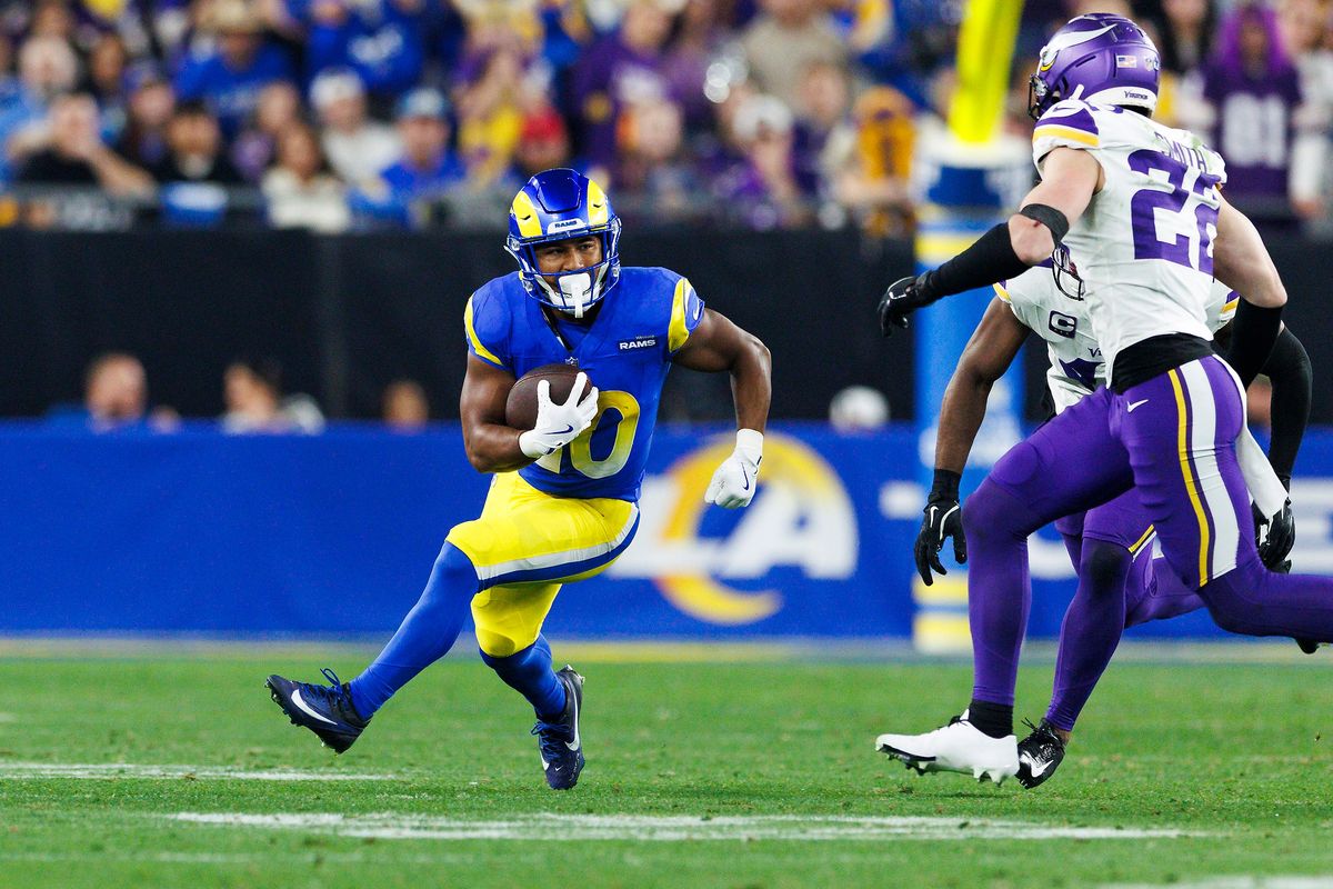 Ronnie Rivers #20 of the Los Angeles Rams runs with the ball during the second half of the NFC Wild Card Playoff game against the Minnesota Vikings at State Farm Stadium on January 13, 2025 in Glendale, Arizona. Ronnie Rivers #20 of the Los Angeles Rams runs with the ball during the second half of the NFC Wild Card Playoff game against the Minnesota Vikings at State Farm Stadium on January 13, 2025 in Glendale, Arizona.