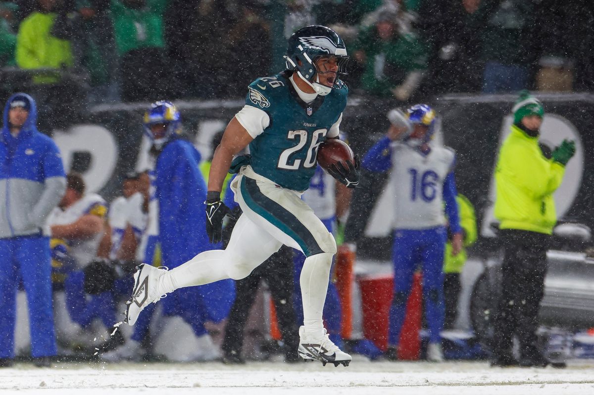 Saquon Barkley #26 of the Philadelphia Eagles runs for a touchdown in the fourth quarter during the NFC Divisional Playoff game against the Los Angeles Rams at Lincoln Financial Field on January 19, 2025 in Philadelphia, Pennsylvania. Saquon Barkley #26 of the Philadelphia Eagles runs for a touchdown in the fourth quarter during the NFC Divisional Playoff game against the Los Angeles Rams at Lincoln Financial Field on January 19, 2025 in Philadelphia, Pennsylvania.
