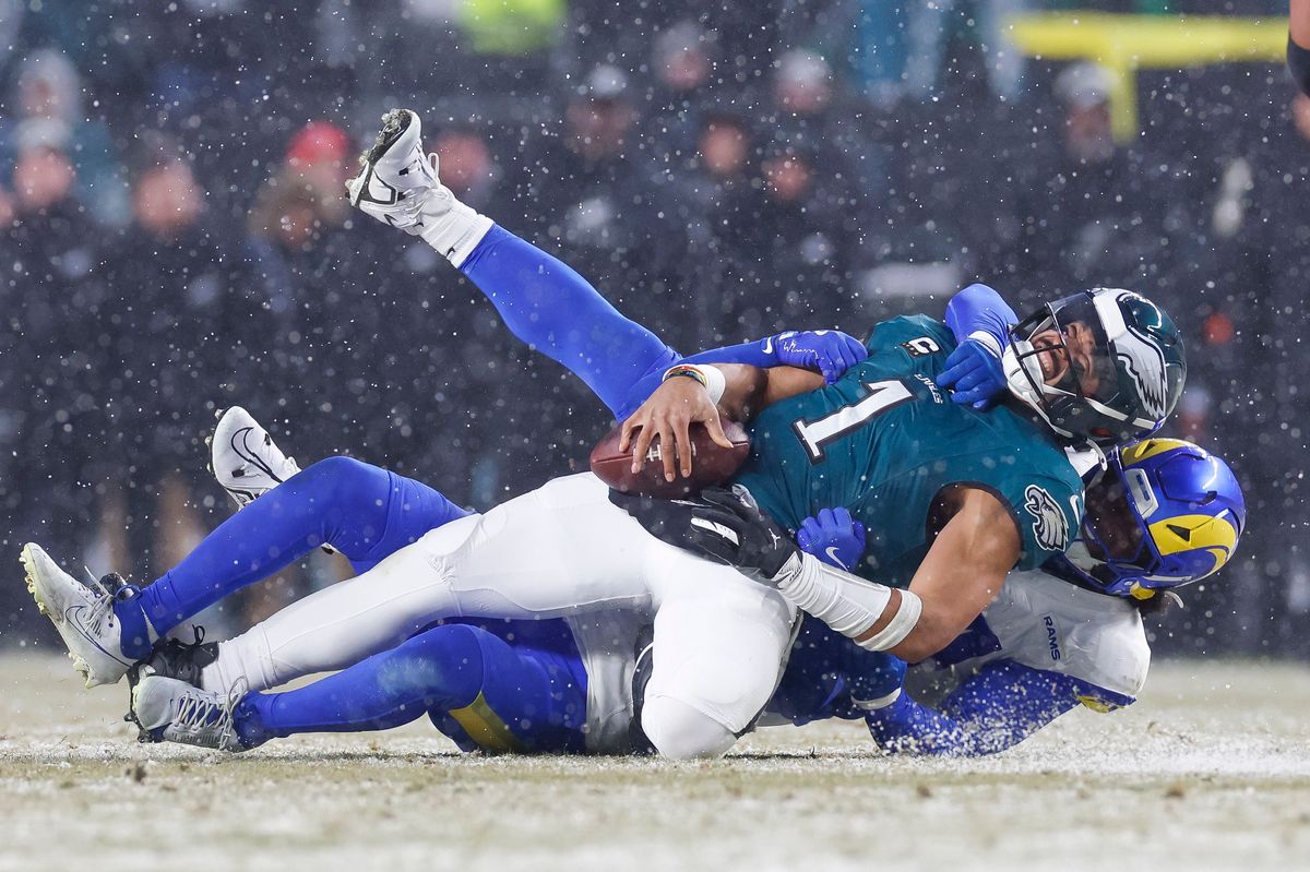 Jalen Hurts #1 of the Philadelphia Eagles is sacked by Jaylen McCollough #39 of the Los Angeles Rams in the third quarter during the NFC Divisional Playoff game at Lincoln Financial Field on January 19, 2025 in Philadelphia, Pennsylvania. Jalen Hurts #1 of the Philadelphia Eagles is sacked by Jaylen McCollough #39 of the Los Angeles Rams in the third quarter during the NFC Divisional Playoff game at Lincoln Financial Field on January 19, 2025 in Philadelphia, Pennsylvania.