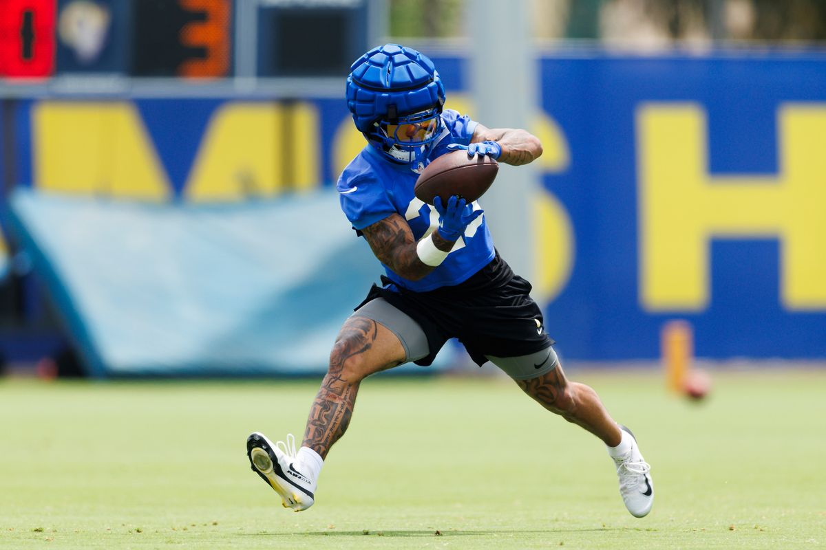 Kyren Williams #23 of the Los Angeles Rams catches the ball during an OTA offseason workout on June 3, 2025 in Woodland Hills, California. 