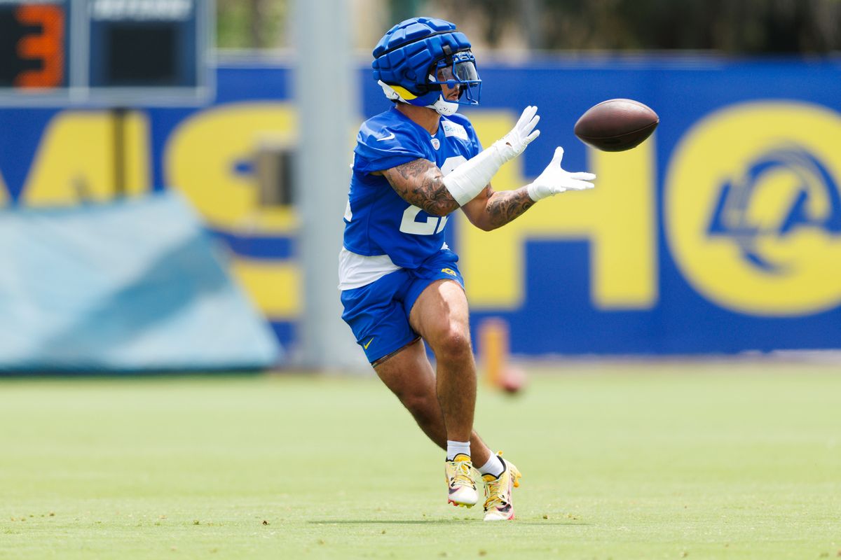 Blake Corum #22 of the Los Angeles Rams catches the ball during an OTA offseason workout on June 3, 2025 in Woodland Hills, California. 