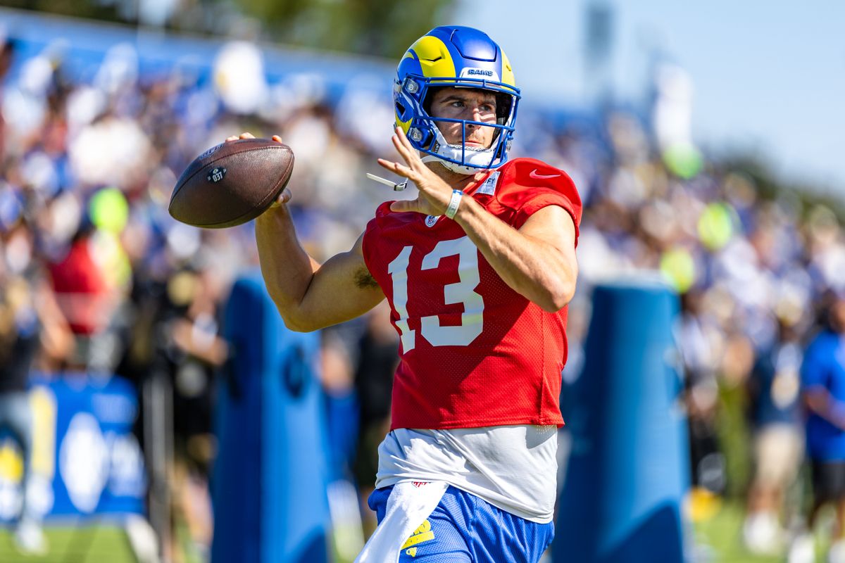 Los Angeles Rams quarterback Stetson Bennett (13) throws a pass during training camp at Loyola Marymount University, Thursday July 24, 2025 in Los Angeles, Calif.