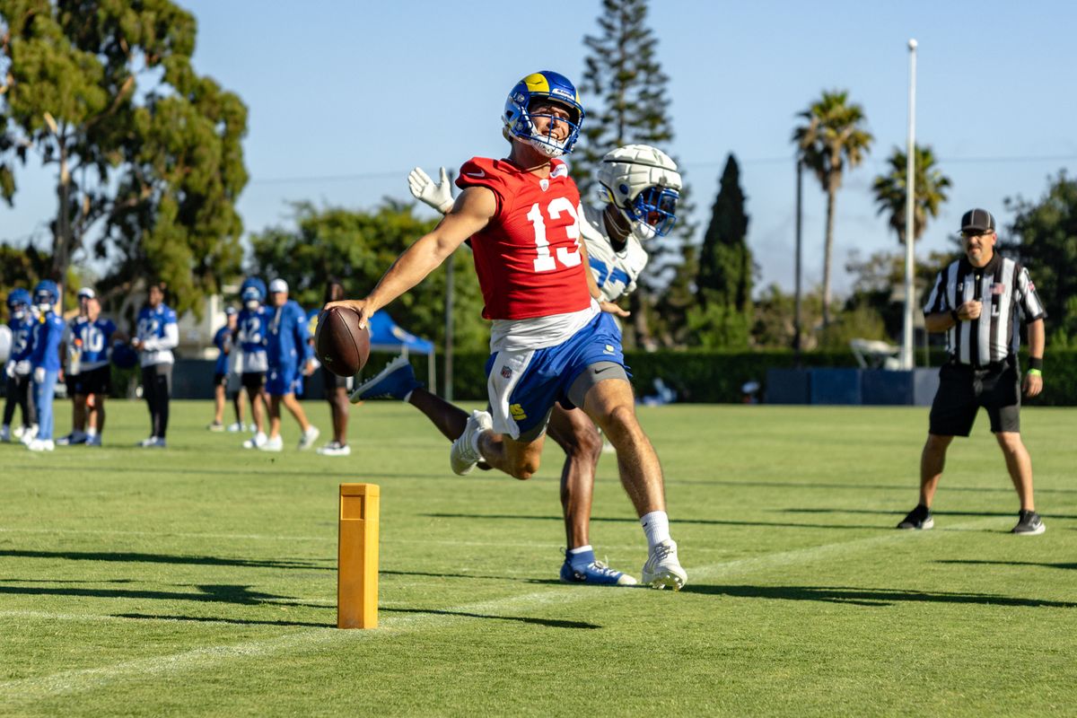 Los Angeles Rams quarterback Stetson Bennett (13) reaches for a touchdown during training camp at Loyola Marymount University, Thursday July 24, 2025 in Los Angeles, Calif.