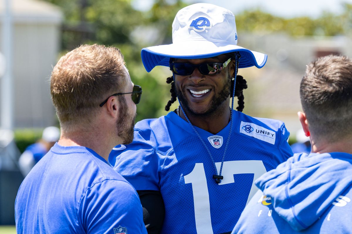 Los Angeles Rams wide receiver Davante Adams (17) talks with head coach Sean McVay during training camp at Loyola Marymount University, Friday July 25, 2025 in Los Angeles, Calif.