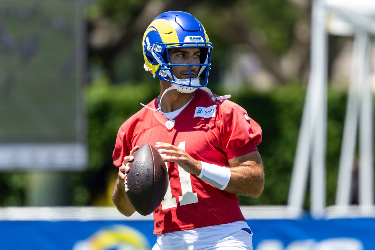 Los Angeles Rams quarterback Jimmy Garoppolo (11) drops back to pass during training camp at Loyola Marymount University, Friday July 25, 2025 in Los Angeles, Calif.
