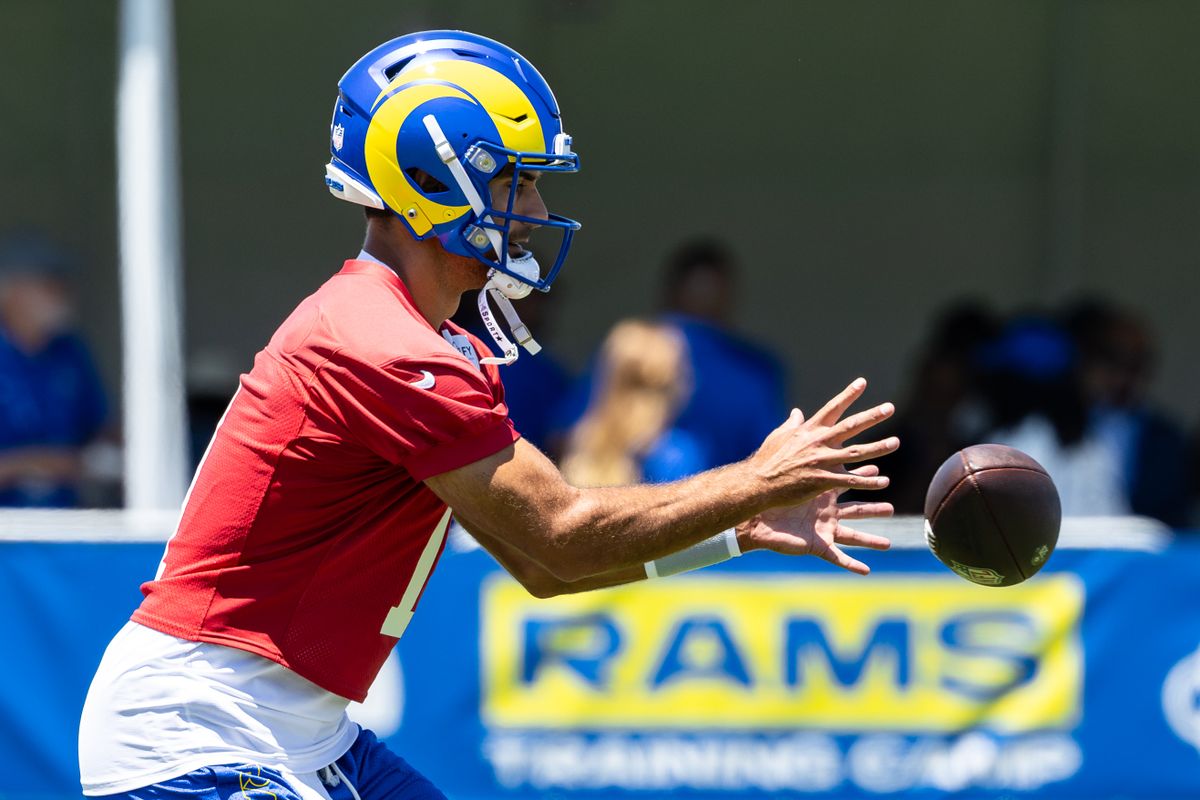 Los Angeles Rams quarterback Jimmy Garoppolo (11) takes a snap during training camp at Loyola Marymount University, Friday July 25, 2025 in Los Angeles, Calif.