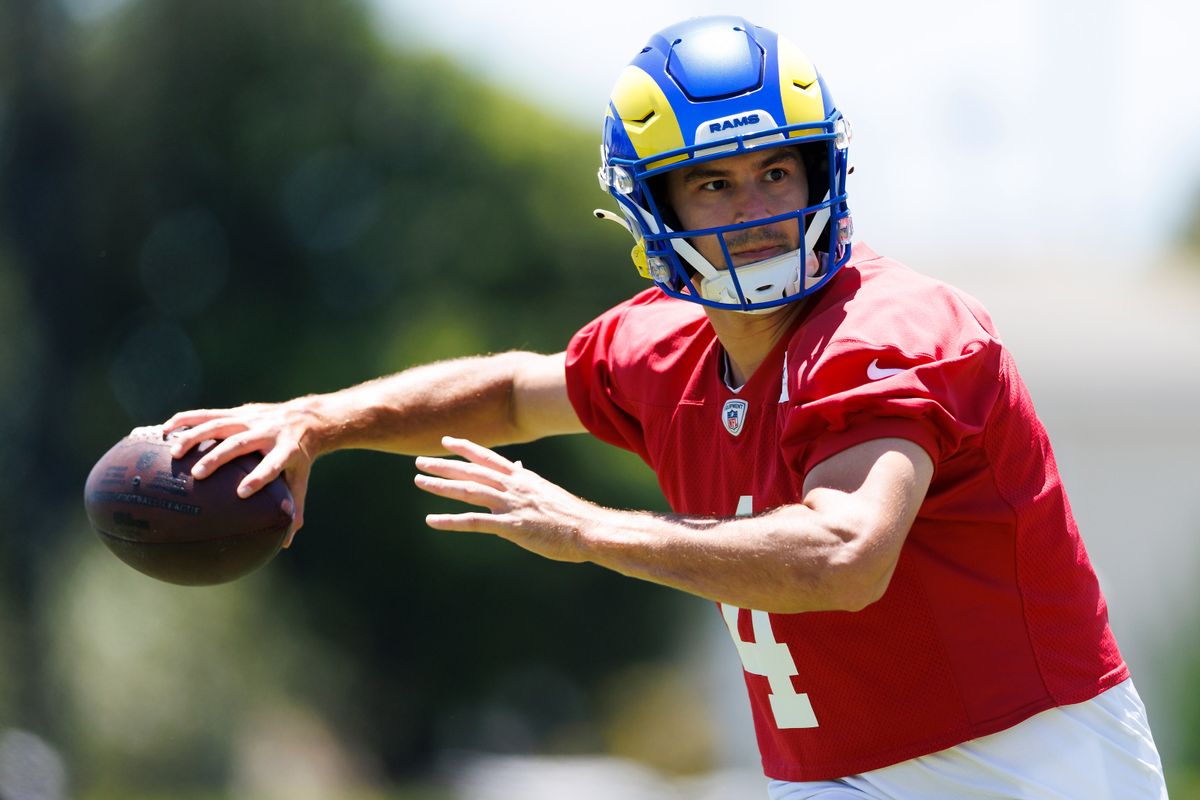 Dresser Winn #4 of the Los Angeles Rams throws during training camp practice at Loyola Marymount University on July 25, 2025 in Los Angeles, California.