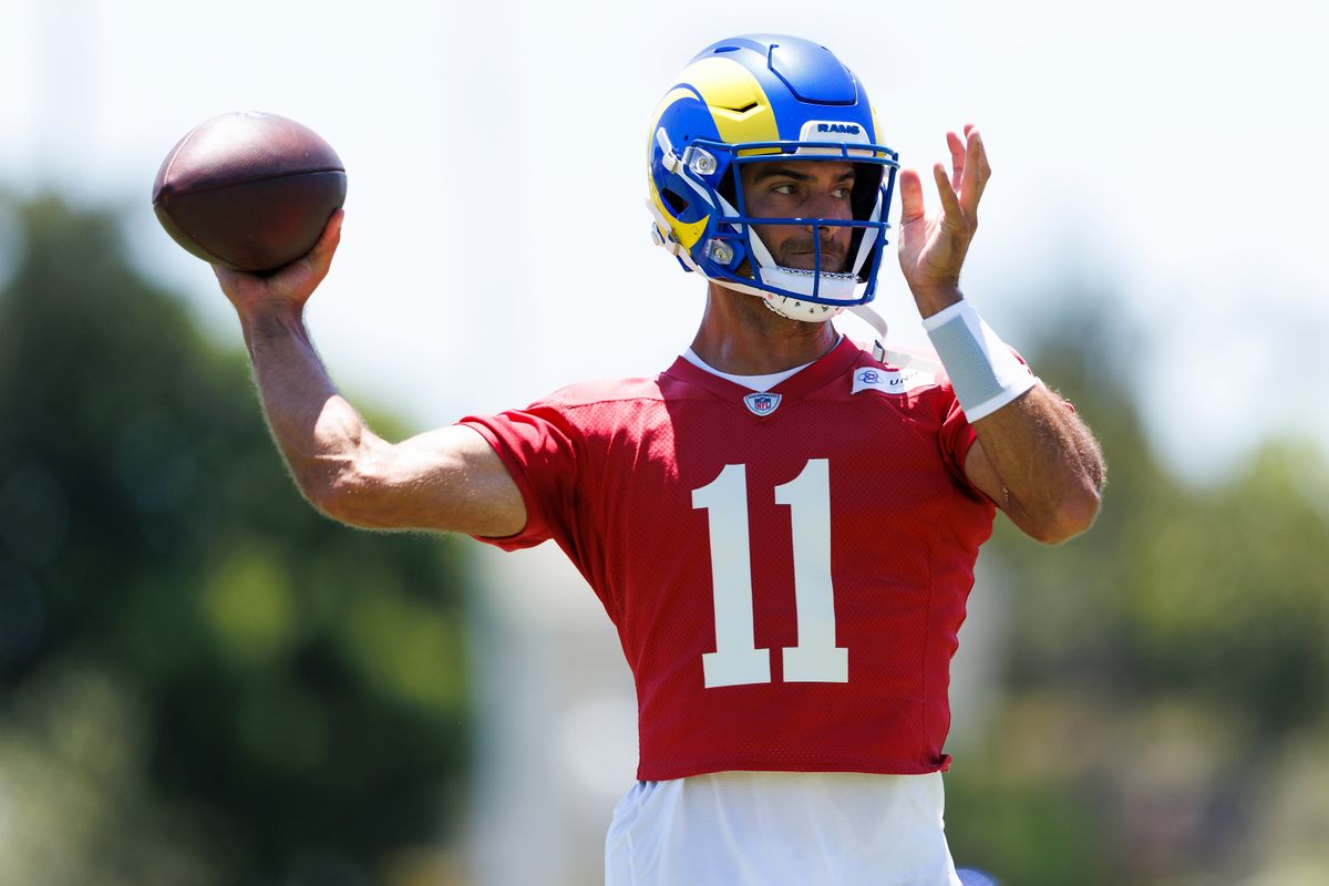 Jimmy Garoppolo #11 of the Los Angeles Rams throws during training camp practice at Loyola Marymount University on July 25, 2025 in Los Angeles, California.
