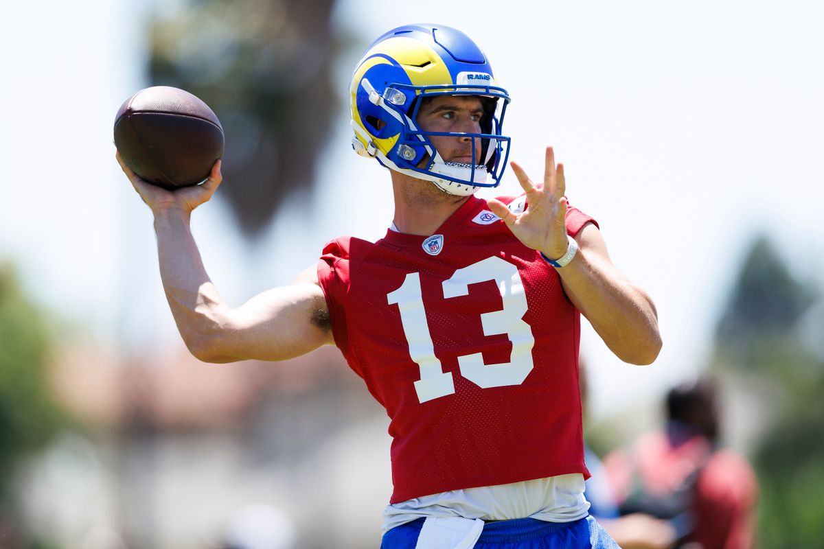 Stetson Bennett #13 of the Los Angeles Rams throws during training camp practice at Loyola Marymount University on July 25, 2025 in Los Angeles, California.