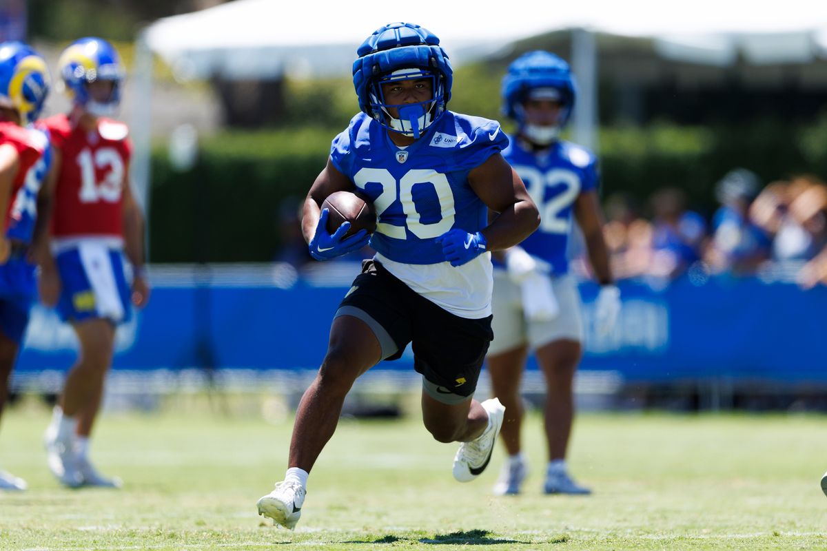Ronnie Rivers #20 of the Los Angeles Rams runs with the ball during training camp practice at Loyola Marymount University on July 25, 2025 in Los Angeles, California. 