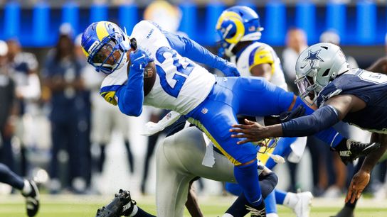 Los Angeles Rams running back Blake Corum #22 is tackled during the first half against the Dallas Cowboys at SoFi Stadium on August 9, 2025 in Inglewood, California. Los Angeles Rams running back Blake Corum #22 is tackled during the first half against the Dallas Cowboys at SoFi Stadium on August 9, 2025 in Inglewood, California.
