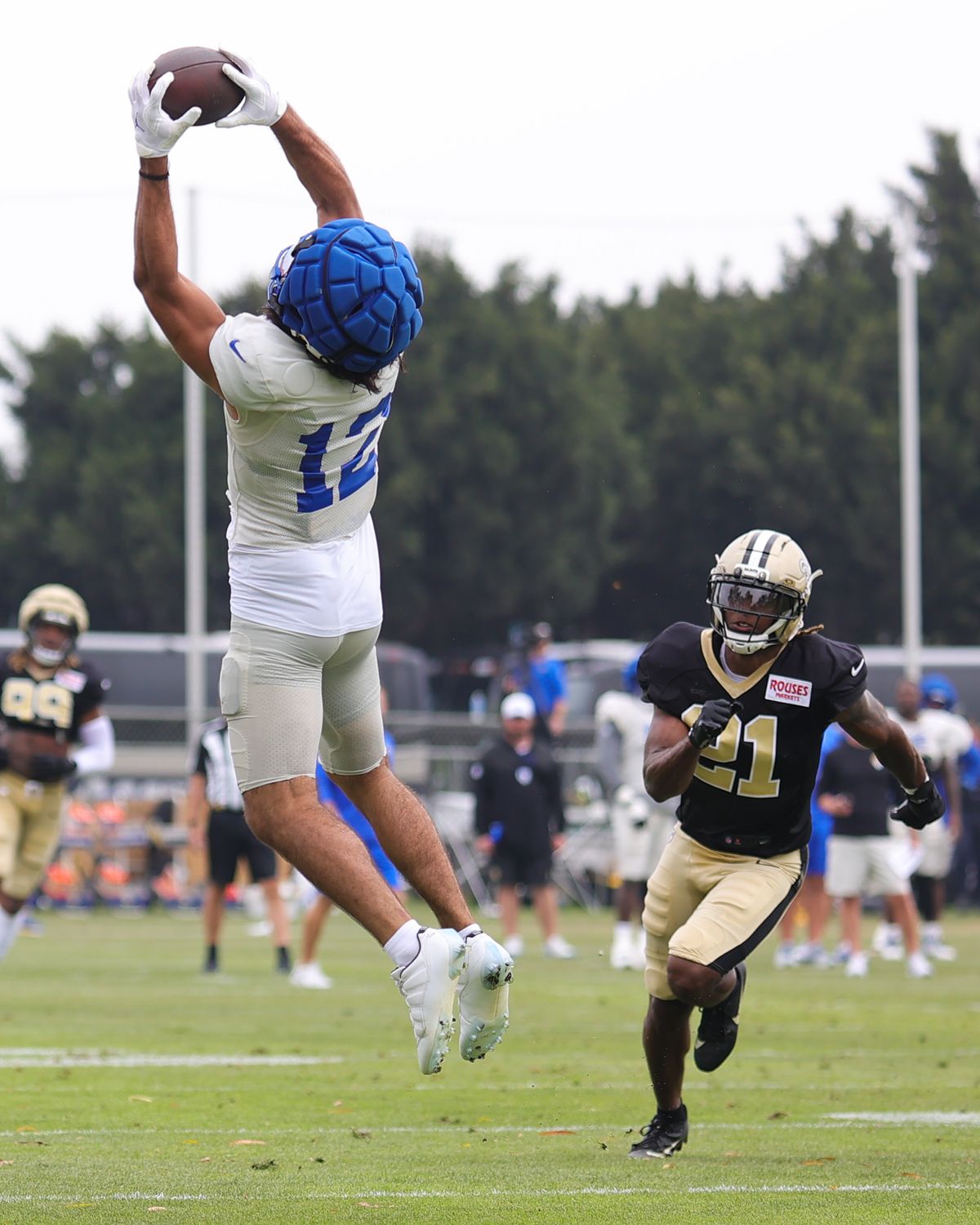 #12 Puka Nacua of the Los Angeles Rams catches a pass during joint practice against the New Orleans Saints on August 14, 2025 in Carson, CA.