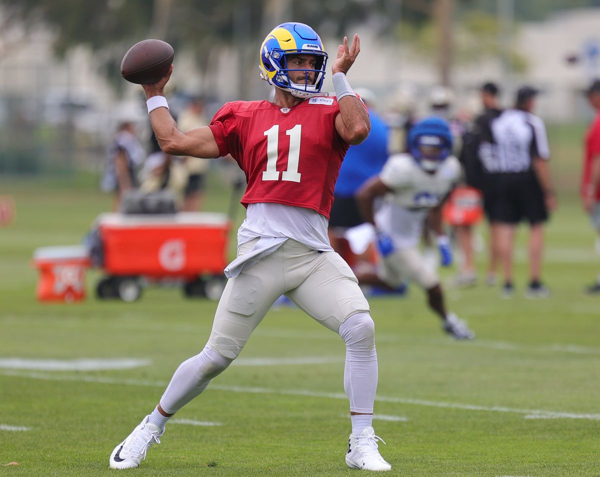 #11 Jimmy Garoppolo of the Los Angeles Rams throws a pass during joint practice against the New Orleans Saints on August 14, 2025 in Carson, CA.