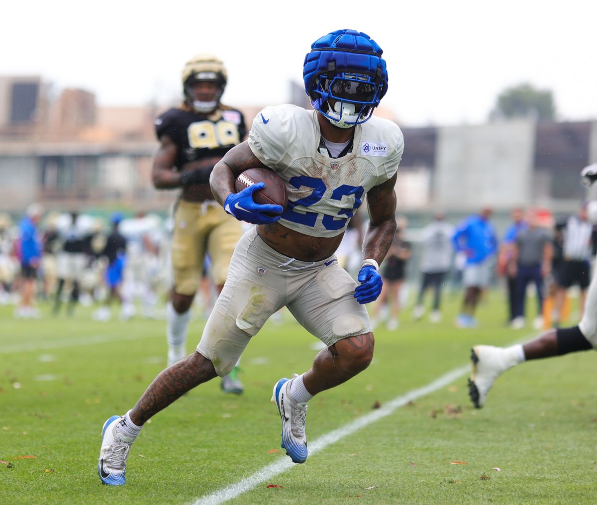 #23 Kyren Williams of the Los Angeles Rams trots into the end zone during joint practice against the New Orleans Saints on August 14, 2025 in Carson, CA.