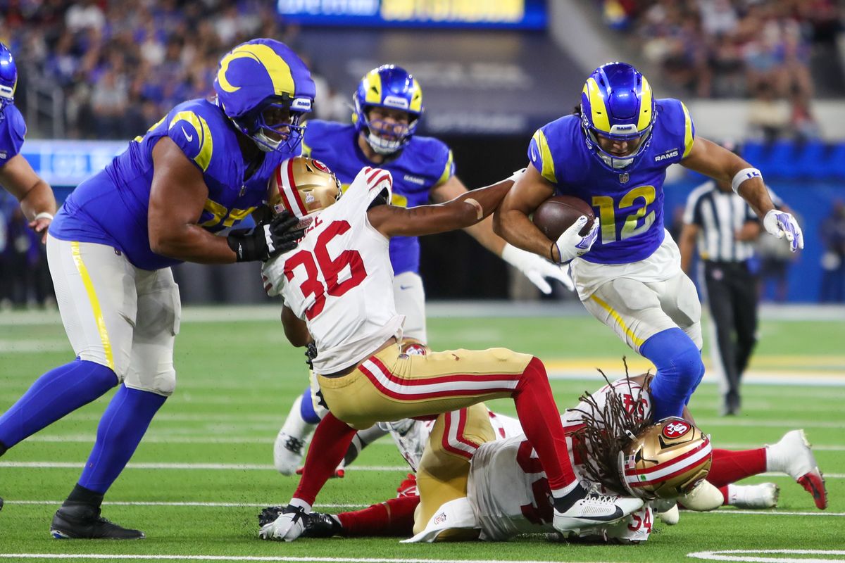#12 Puka Nacua of the Los Angeles Rams evades defender with the football during an NFL game against the San Fransisco 49ers on October 2, 2025 in Inglewood, CA. #12 Puka Nacua of the Los Angeles Rams evades defender with the football during an NFL game against the San Fransisco 49ers on October 2, 2025 in Inglewood, CA.