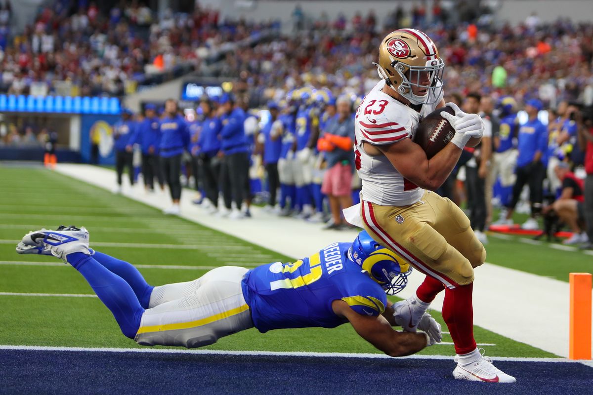 #23 Christian McCaffey of the San Fransisco 49ers scores a touchdown during an NFL game against the Los Angeles Rams on October 2, 2025 in Inglewood, CA. #23 Christian McCaffey of the San Fransisco 49ers scores a touchdown during an NFL game against the Los Angeles Rams on October 2, 2025 in Inglewood, CA.