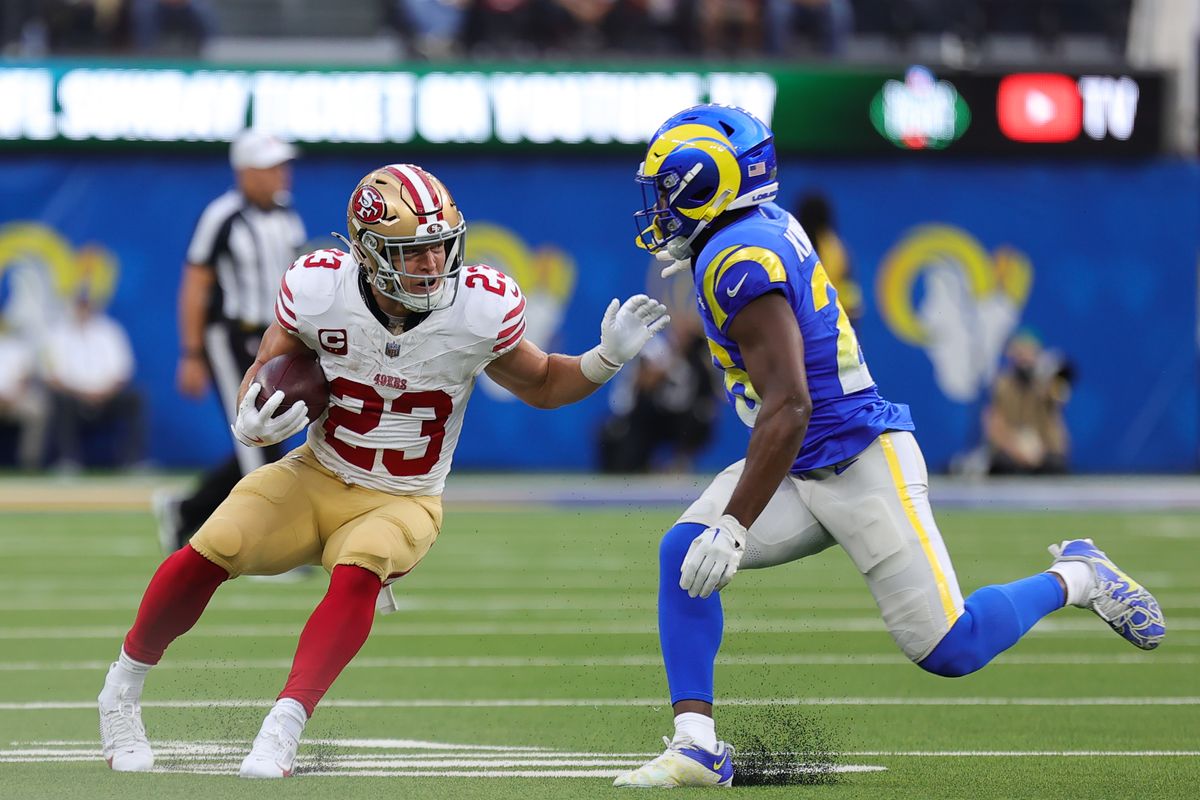 #23 Christian McCaffey of the San Fransisco 49ers evades a defender during an NFL game against the Los Angeles Rams on October 2, 2025 in Inglewood, CA. #23 Christian McCaffey of the San Fransisco 49ers evades a defender during an NFL game against the Los Angeles Rams on October 2, 2025 in Inglewood, CA.