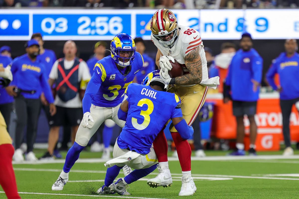 #3 Kam Curl of the Los Angeles Rams tackles #89 Luke Farrell of the San Fransisco 49ers during an NFL game on October 2, 2025 in Inglewood, CA. #3 Kam Curl of the Los Angeles Rams tackles #89 Luke Farrell of the San Fransisco 49ers during an NFL game on October 2, 2025 in Inglewood, CA.