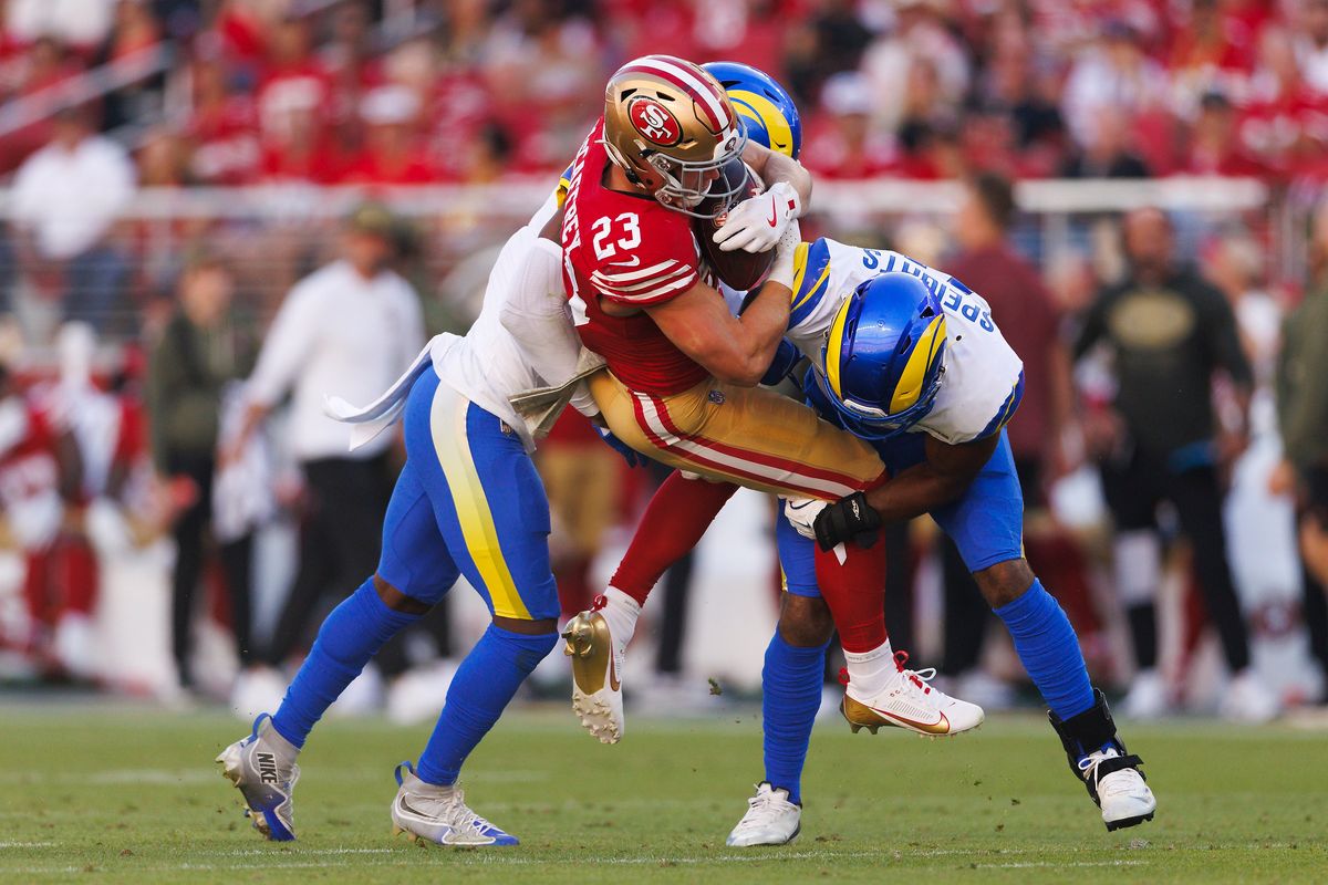 Christian McCaffrey #23 of the San Francisco 49ers is tackled during the game against the Los Angeles Rams at Levi’s Stadium on November 9, 2025 in Santa Clara, California. Christian McCaffrey #23 of the San Francisco 49ers is tackled during the game against the Los Angeles Rams at Levi’s Stadium on November 9, 2025 in Santa Clara, California.