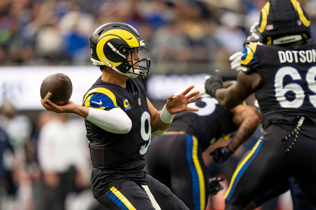 Los Angeles Rams quarterback, Matthew Stafford (9) sidearms a pass during an NFL football game against the Seattle Seahawks on November 16, 2025 in Los Angeles, CA.