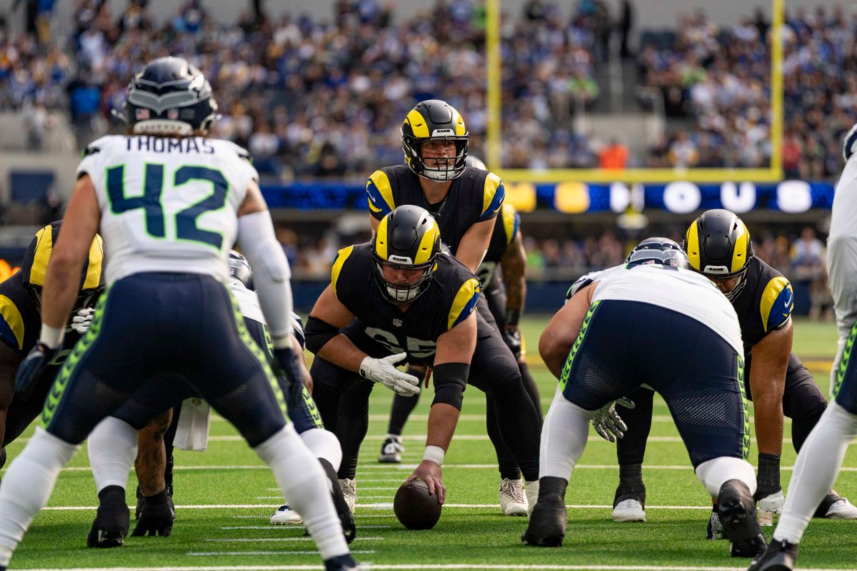 Los Angeles Rams quarterback, Matthew Stafford (9) checks the defense during an NFL football game against the Seattle Seahawks on November 16, 2025 in Los Angeles, CA.