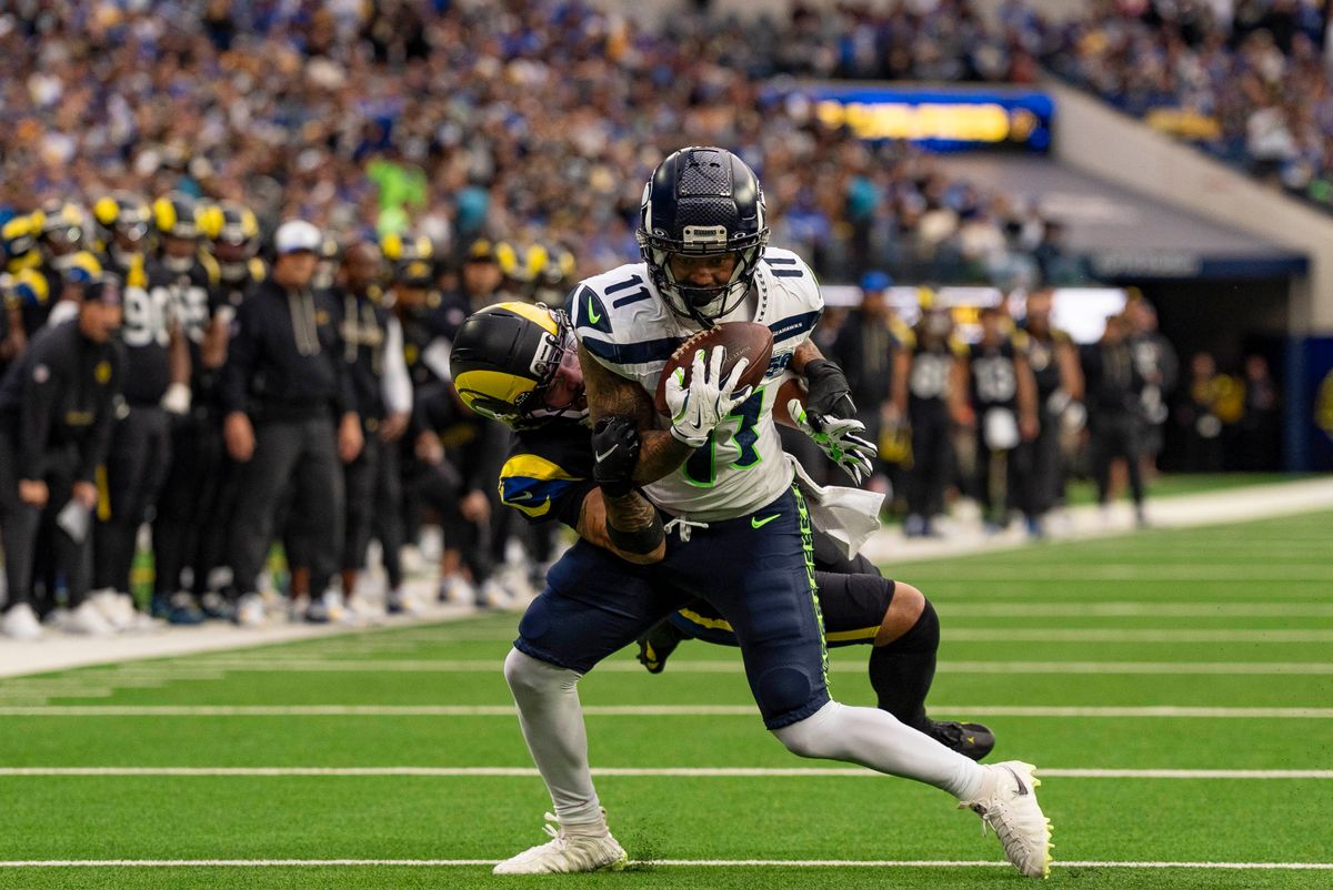 Seattle Seahawks wide receiver, Jaxon Smith-Njigba (11) catches a pass just short of a touchdown during an NFL football game against the Los Angeles Rams on November 16, 2025 in Los Angeles, CA.