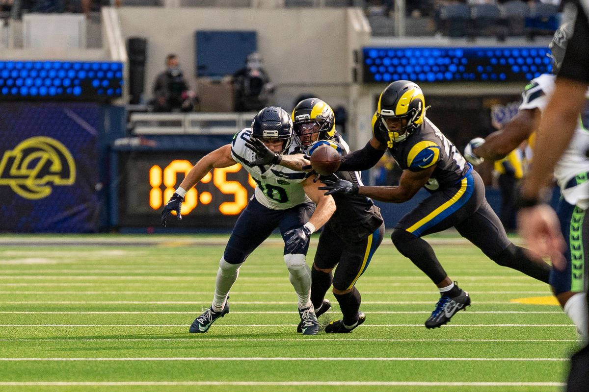 Los Angeles Rams safety, Kamren Kinchens (26) intercepts a pass from Sam Darnold (14)  during an NFL football game against the Seattle Seahawks on November 16, 2025 in Los Angeles, CA.