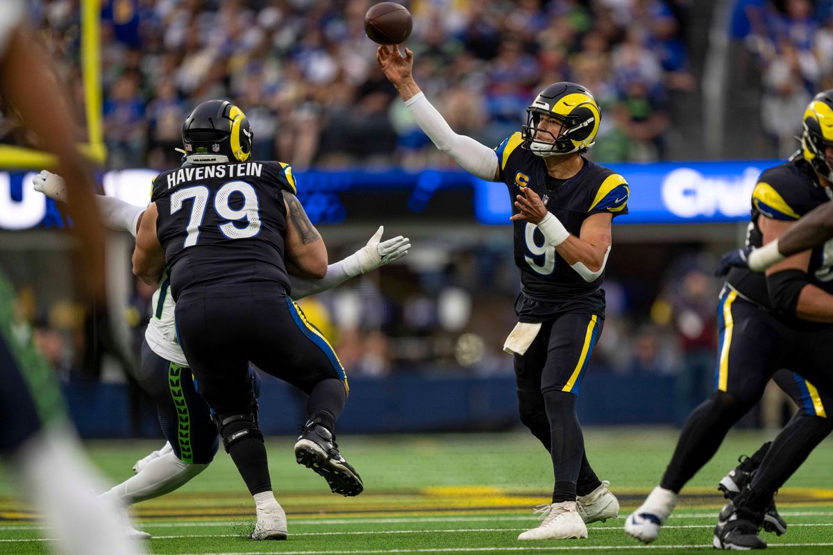 Los Angeles Rams quarterback, Matthew Stafford (9) passes the football during an NFL football game against the Seattle Seahawks on November 16, 2025 in Los Angeles, CA.