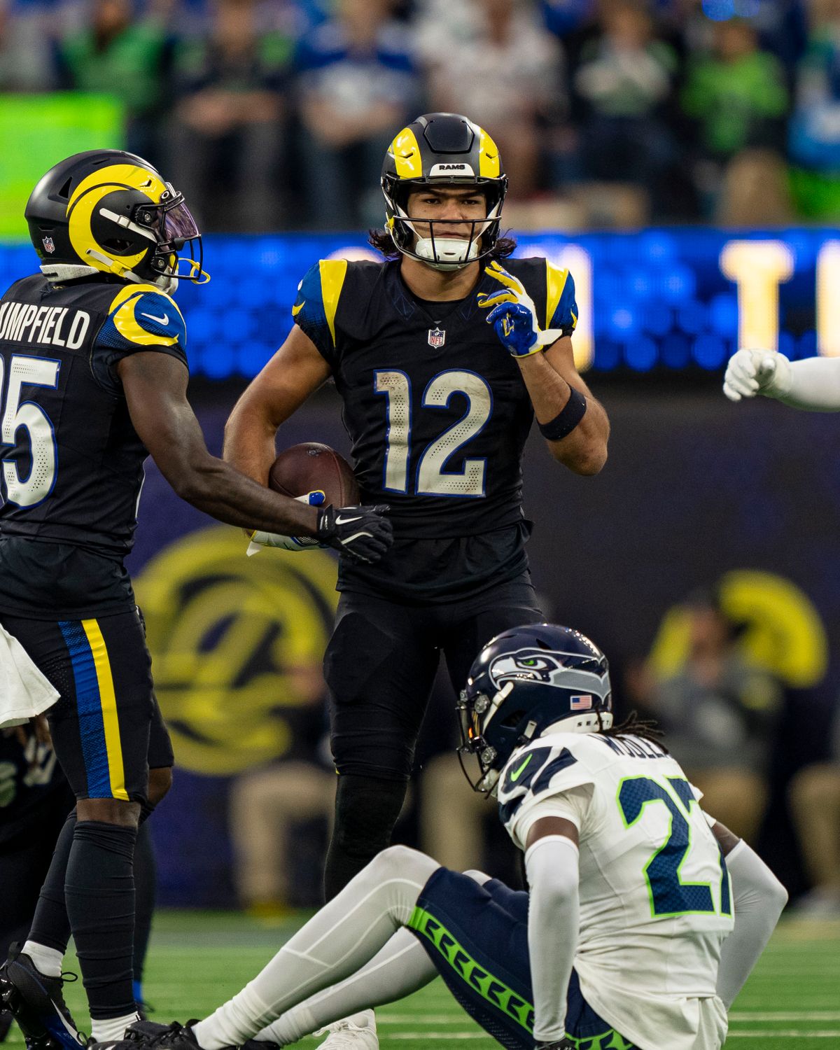 Los Angeles Rams wide receiver, Puka Nacua (12) celebrates a first down during an NFL football game against the Seattle Seahawks on November 16, 2025 in Los Angeles, CA.