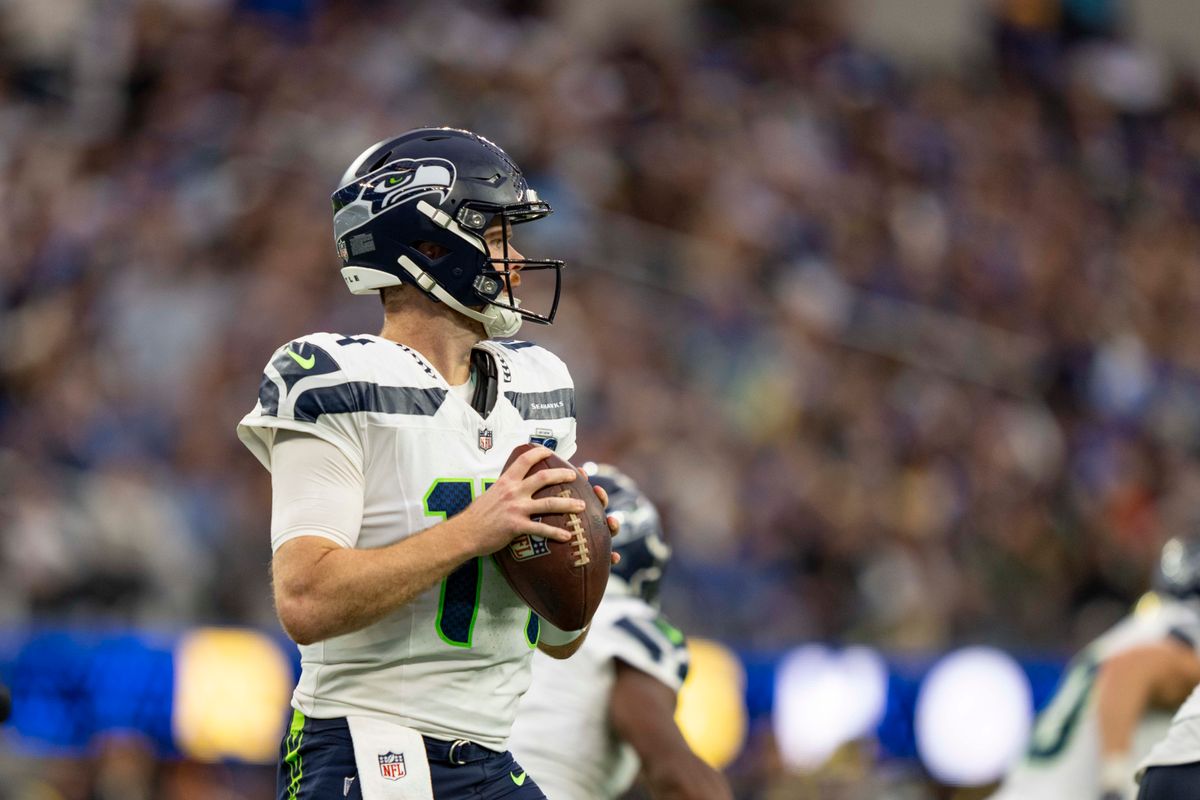 Seattle Seahawks quarterback, Sam Darnold (14) looks for receivers during an NFL football game against the Los Angeles Rams on November 16, 2025 in Los Angeles, CA.