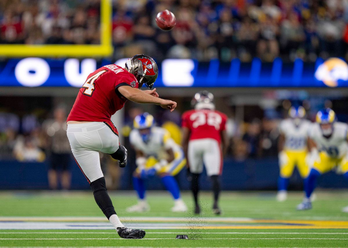Tampa Bay Buccaneers kicker, Chase McLaughlin (4) punts the ball away during an NFL football game against the Los Angeles Rams on November 23, 2025 in Los Angeles, CA.
