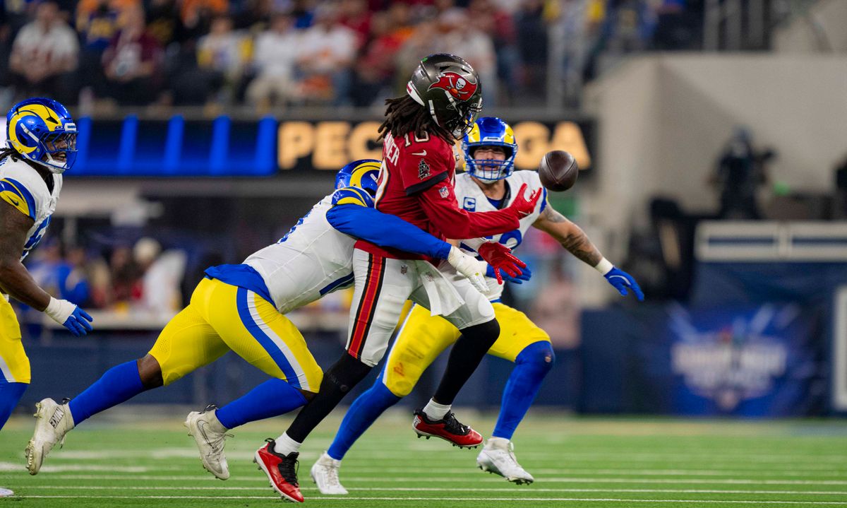 Tampa Bay Buccaneers backup quarterback, Teddy Bridgewater (10) gets rid of the ball to avoid a sack during an NFL football game against the Los Angeles Rams on November 23, 2025 in Los Angeles, CA.