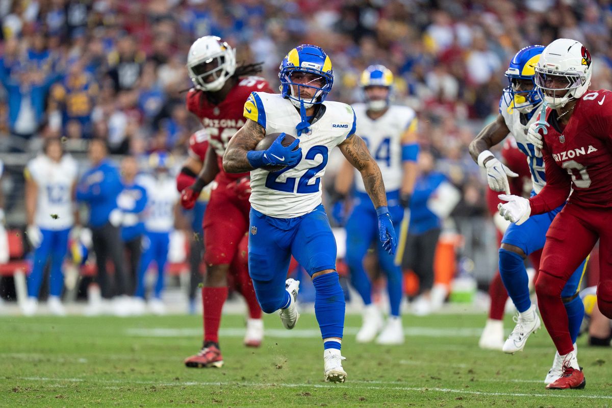 Los Angeles Rams running back Blake Corum (22) rushes for a touchdown during an NFL football game against the Arizona Cardinals on Sunday, Dec. 7, 2025, in Glendale, AZ.